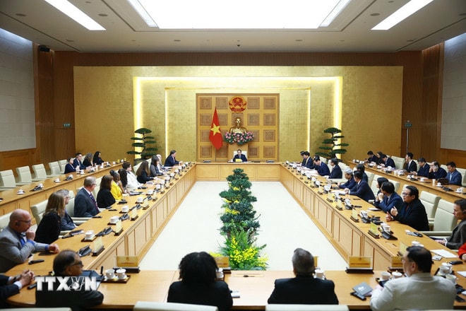 Thủ tướng Phạm Minh Chính tiếp lãnh đạo các Trường Đại học của Hoa Kỳ sang Việt Nam tham dự Chương trình Hợp tác Học thuật Quốc tế (IAPP). (Ảnh: Dương Giang/TTXVN) ttxvn-thu-tuong-dai-hoc-hoa-ky-7.jpg