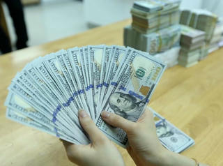 Ngày 14/4: Tỷ giá USD trong nước và thế giới cùng chiều giảm