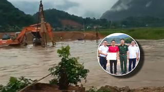 Thấy 2 cháu bé chới với giữa dòng nước lũ, nam công nhân liều mình nhảy xuống cứu 