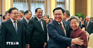 Chủ tịch Quốc hội Vương Đình Huệ dự Gặp gỡ hữu nghị nhân dân Việt Nam-Trung Quốc
