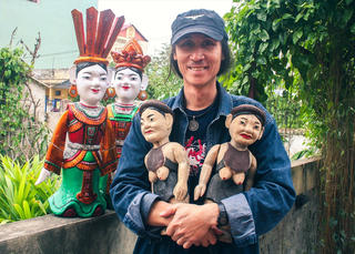 Người giữ hồn cho múa rối nước