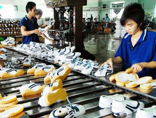 Điều chỉnh tỷ giá: Doanh nghiệp xuất khẩu hưởng lợi