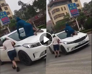 [VIDEO] Nghi chồng đi với 'tiểu tam', người phụ nữ nhảy lên nắp capo, đập vỡ kính