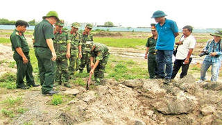 Thân nhân liệt sĩ có được hỗ trợ tiền đi tìm mộ liệt sĩ không?