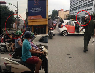 Tài xế taxi leo lên nóc xe 'ăn vạ' khi bị cảnh sát dừng xe