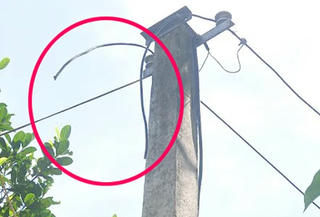Liều lĩnh cắt đường dây điện chạy qua nhà mình