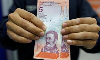 Venezuela tê liệt sau khi phát hành đồng tiền mới