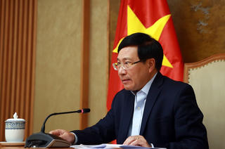 Phó Thủ tướng Phạm Bình Minh điện đàm với Cố vấn an ninh quốc gia Hoa Kỳ
