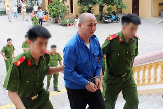 Tử hình kẻ vận chuyển 11 bánh heroin lấy 50 triệu đồng tiền công