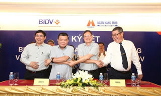 Ký kết Biên bản bàn giao toàn hệ thống và công bố sáp nhập MHB vào BIDV