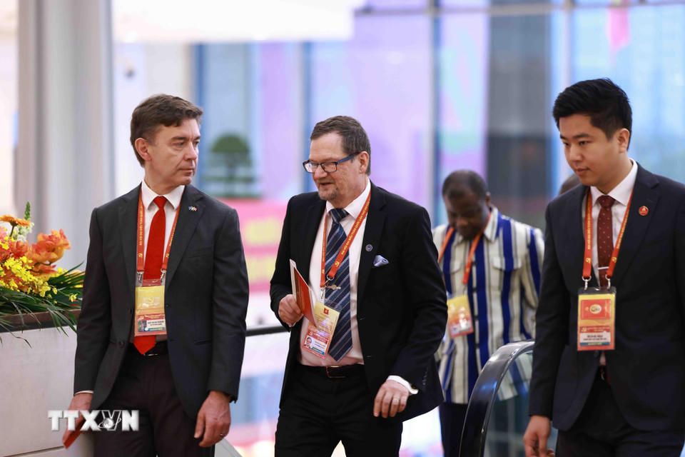 Các đại biểu quốc tế đến dự phiên khai mạc Đại hội XIV của Đảng. (Nguồn: TTXVN)