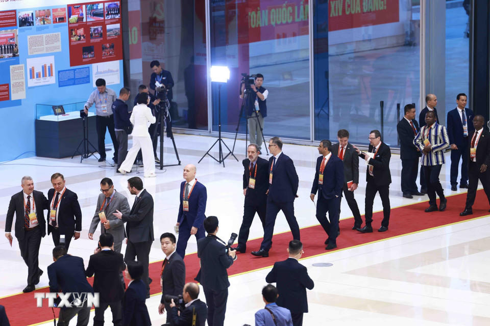 Các đại biểu quốc tế đến dự phiên khai mạc Đại hội XIV của Đảng. (Nguồn: TTXVN)